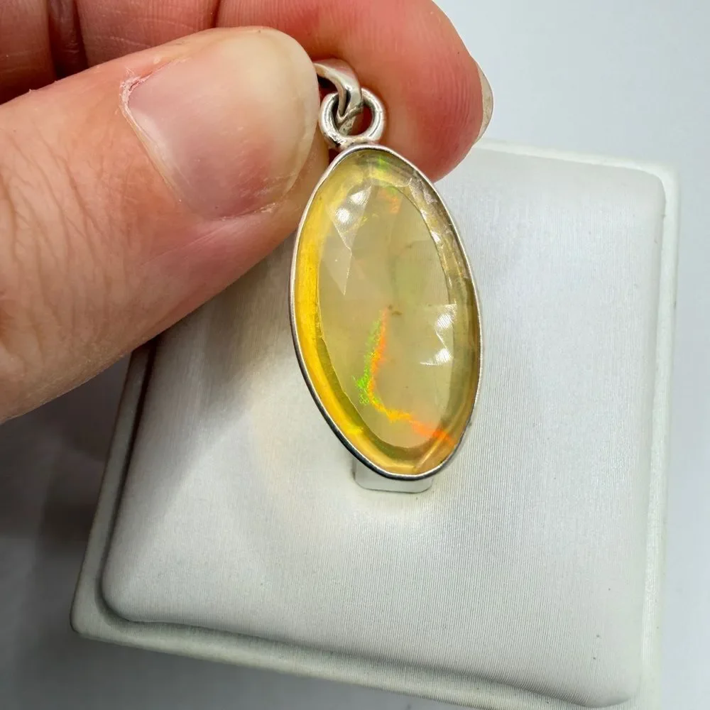 NWT‎ 12x22mm faceted oval cut OPAL pendant in sterling silver!